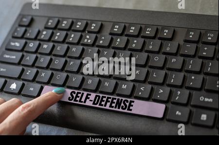 Handwriting text Self Defense, Word for the act of defending one's person when physically attacked Stock Photo