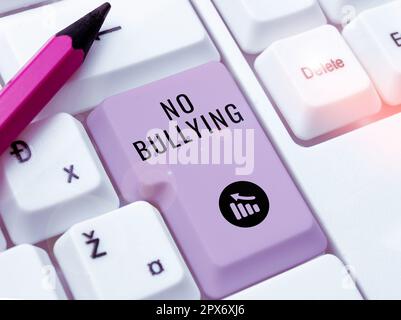 Sign displaying No Bullying, Word Written on stop aggressive behavior among children power imbalance Stock Photo