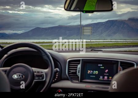 Reykjavik, Iceland - Looking at the mountain view from inside the car Stock Photo