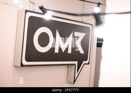 Hamburg, Germany. 17th Apr, 2023. The OMR logo is in the basement of the company's headquarters. When the team from Hamburg-based media and digital company OMR calls, many decision-makers from global companies and celebrities don't ask twice. The OMR festival also brings so many people to the city that overnight accommodations become scarce. Credit: Jonas Walzberg/dpa/Alamy Live News Stock Photo