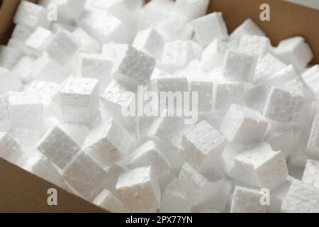 Closeup view of cardboard box with styrofoam cubes Stock Photo