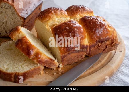 Sliced homemade brioche on a cutting board Stock Photo