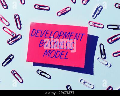 Sign displaying Development Business Model, Word for rationale of how an organization created Stock Photo
