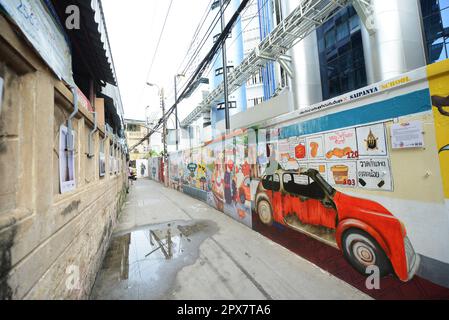 Walking through the historical neighborhood of Talat Noi in Bangkok, Thailand. Stock Photo