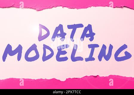 Writing displaying text Data Modeling, Word for process of transferring data between data storage systems Stock Photo