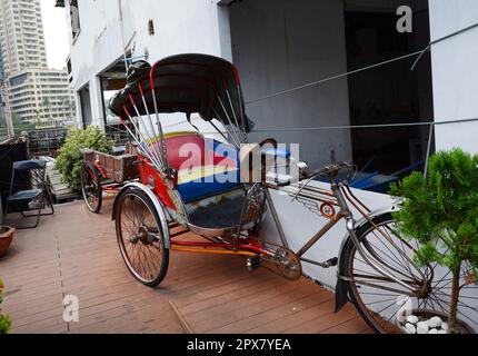 Walking through the historical neighborhood of Talat Noi in Bangkok, Thailand. Stock Photo