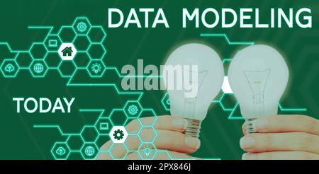 Text caption presenting Data Modeling, Business approach process of transferring data between data storage systems Stock Photo