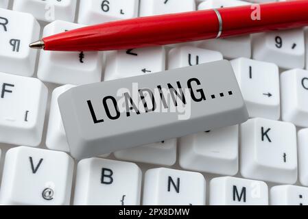 Sign displaying Loading, Business overview time takes to download and display the content of a web page Stock Photo