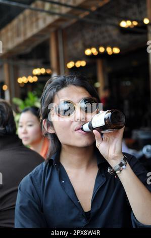 A street bar at the colorful and vibrant Chatuchak weekend market in Bangkok, Thailand. Stock Photo