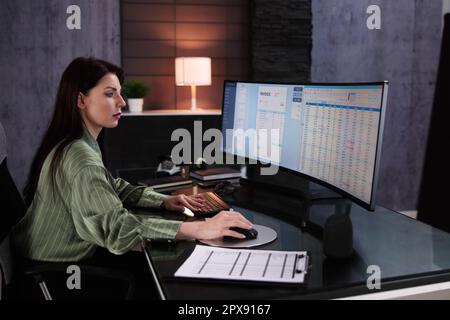 Account Manager In Office Coding Medical Bill Stock Photo