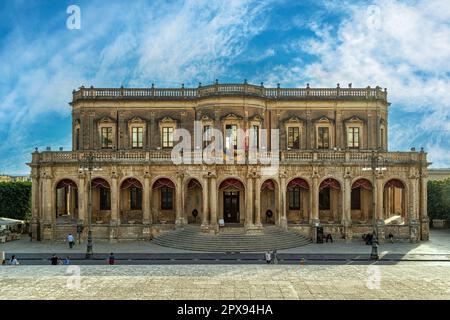 Palazzo Ducezio is the seat of the town hall of Noto, the name is in honor of Ducezio, founder of the city. In neoclassical style with a convex facade. Stock Photo