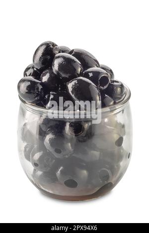 Pitted black olives in glass cup isolated on white with clipping path included Stock Photo