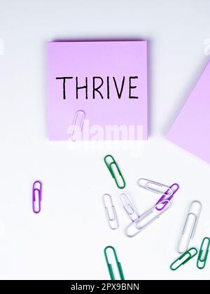 Hand writing sign Thrive, Word for Think positively Continue to prosper ...