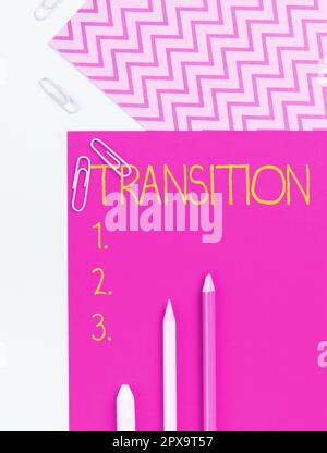 Writing displaying text Transition, Concept meaning a dramatic or sweeping alteration of shape or appearance Stock Photo