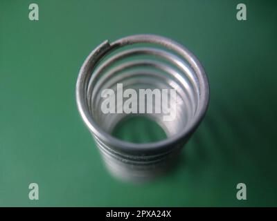 Metal spring for the technical products Stock Photo