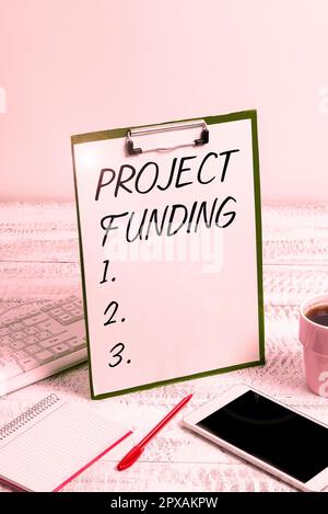 Sign displaying Project Funding, Word Written on paying for start up in order make it bigger and successful Stock Photo