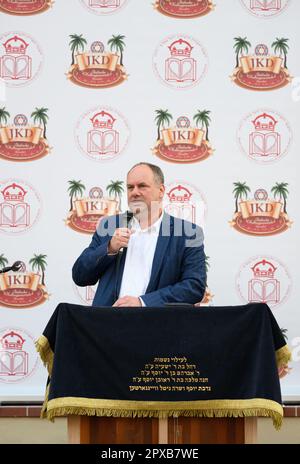 Dresden, Germany. 27th Apr, 2023. Dirk Hilbert (FDP), Mayor of the City of Dresden, speaks at the ceremony of unveiling a Star of David on the outside wall of the domicile of the Jewish Religious Community. The Jewish Community became the third Jewish community in Saxony's state capital at the end of September 2021. Credit: Robert Michael/dpa/Alamy Live News Stock Photo