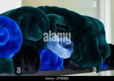 different types of Artificial fur in the store. fur fabric Stock Photo