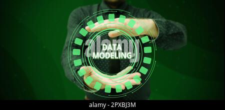 Text caption presenting Data Modeling, Business concept process of transferring data between data storage systems Stock Photo