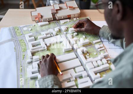 Close-up of African American architect developing new project at table in office Stock Photo