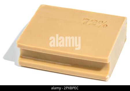 Rectangular brown laundry bar of soap on a white isolated background Stock Photo