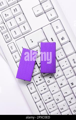 Colored cube with important message lying on keyboard. Main information. Stock Photo