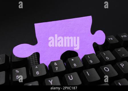 Colored sticker lying on keyboard. Important message written over paper. Stock Photo