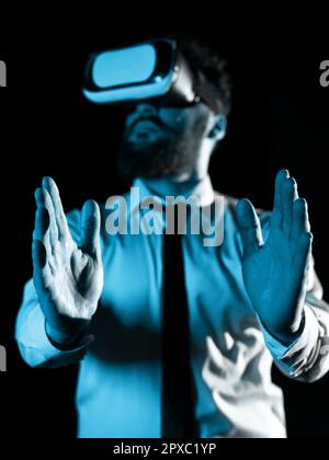 Man Wearing Vr Glasses And Presenting Important Messages Between Hands. Stock Photo