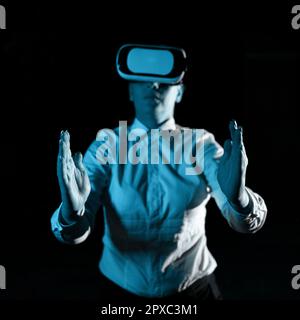 Woman Wearing Vr Glasses And Presenting Important Messages Over Both Hands. Stock Photo
