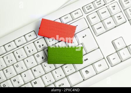 Colored cube with important message lying on keyboard. Main information. Stock Photo