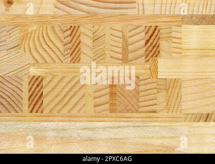 Wooden marquetry, patterns created from the combination of different woods, wooden floor, parquet, cutting board Stock Photo