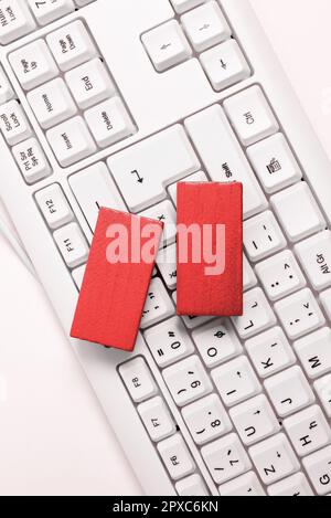 Colored cube with important message lying on keyboard. Main information. Stock Photo