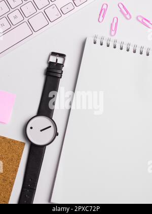 Paper with important text near keyboard. Information written on notebook. Stock Photo