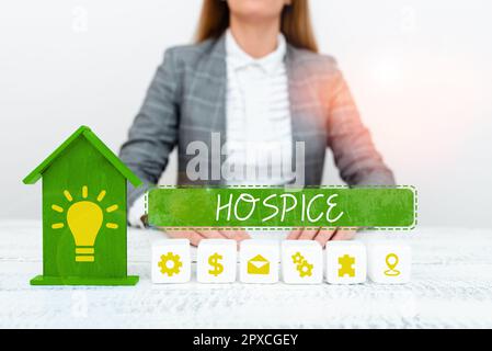 Sign displaying Hospice, Word for focuses on the palliation of a terminally ill patient's pain Stock Photo