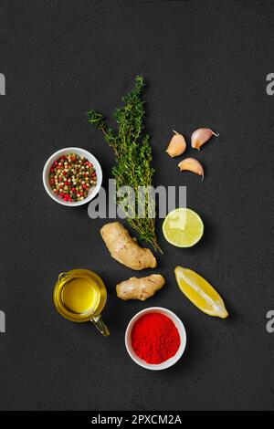 Composition with condiments on black background. All purpose spice, Stock Photo