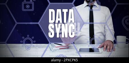 Writing displaying text Data Sync, Concept meaning data that is continuously generated by different sources Stock Photo