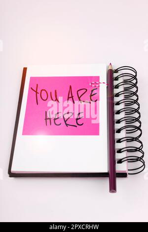 Conceptual caption You Are Here, Word for This is your location reference point global positioning system Stock Photo