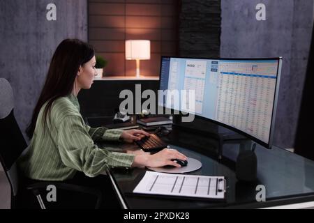 Account Manager In Office Coding Medical Bill Stock Photo