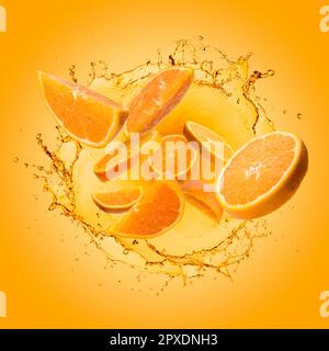 Orange slices jumping out of splashing orange juice on gradient background. Stock Photo