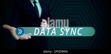 Conceptual caption Data Sync, Word Written on data that is continuously generated by different sources Stock Photo