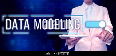 Text caption presenting Data Modeling, Business idea process of transferring data between data storage systems Stock Photo