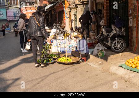 Hanoi, Vietnam, January 2023.  panoramic view of  the traditional food vendors on the  street in the city center. Stock Photo