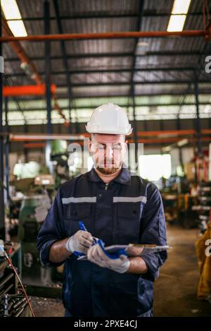 Robotic technicians perform regular maintenance by inspecting, testing, and repairing machinery and engines to ensure they stay in standard condition. Stock Photo