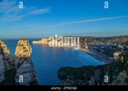 view of the beach of Etretat in Normandy, a popular french seaside town known for its chalk cliffs Stock Photo