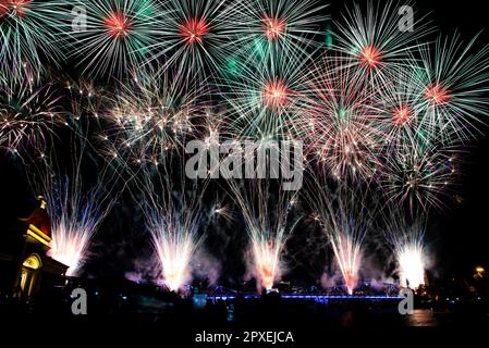 Abstract colored firework new year festival night sky background. Stock Photo