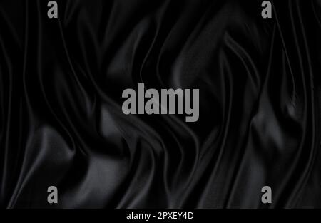 Silk fabric, abstract wavy black satin fabric background Stock Photo
