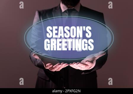 Hand writing sign Season's Greetings, Business concept Used as an expression of goodwill during festivities Stock Photo