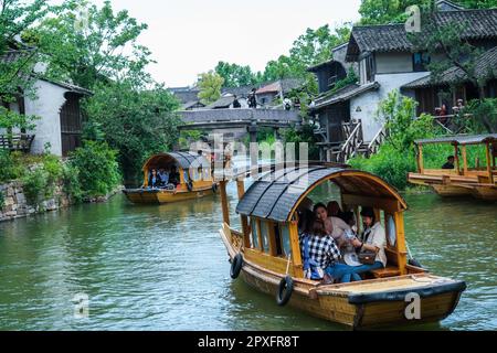 Tongxiang, China's Zhejiang Province. 2nd May, 2023. Tourists visit Puyuan Fashion Resort in Puyuan Town of Tongxiang City, east China's Zhejiang Province, May 2, 2023. Puyuan Fashion Resort receives nearly 20,000 tourists every day during this year's May Day holiday. The resort opened to the public on March 1. Credit: Xu Yu/Xinhua/Alamy Live News Stock Photo