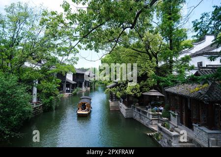 Tongxiang, China's Zhejiang Province. 2nd May, 2023. Tourists visit Puyuan Fashion Resort in Puyuan Town of Tongxiang City, east China's Zhejiang Province, May 2, 2023. Puyuan Fashion Resort receives nearly 20,000 tourists every day during this year's May Day holiday. The resort opened to the public on March 1. Credit: Xu Yu/Xinhua/Alamy Live News Stock Photo