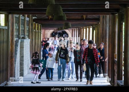 Tongxiang, China's Zhejiang Province. 2nd May, 2023. Tourists visit Puyuan Fashion Resort in Puyuan Town of Tongxiang City, east China's Zhejiang Province, May 2, 2023. Puyuan Fashion Resort receives nearly 20,000 tourists every day during this year's May Day holiday. The resort opened to the public on March 1. Credit: Xu Yu/Xinhua/Alamy Live News Stock Photo